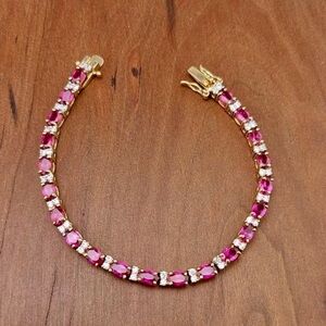 Stampd Gold Bracelet with Pink Stones and Clear Accents